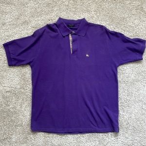 Mens authentic Size L Burberry polo. In used condition with light signs of wear